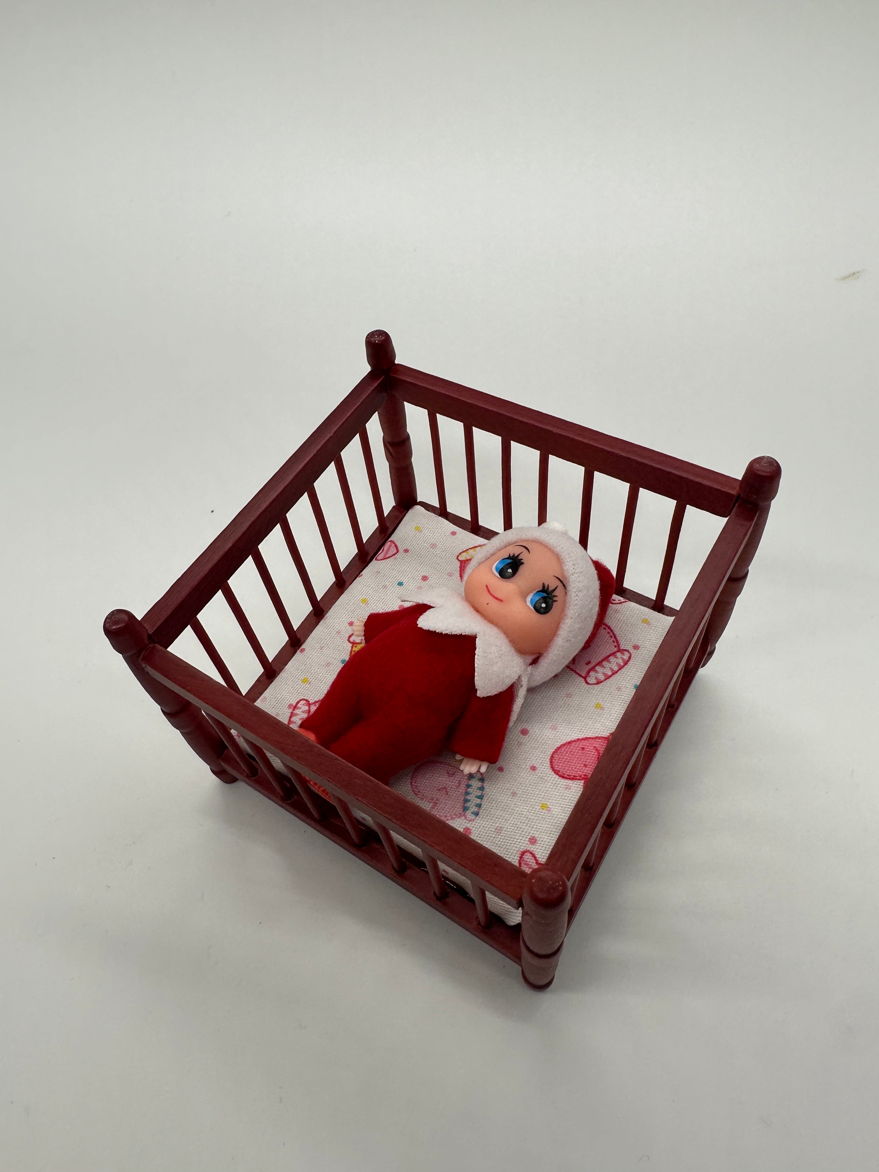 Elf baby doll crib