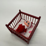 Elf baby doll crib